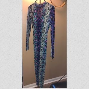 All see through jumpsuit. Finger straps to go around your finger.